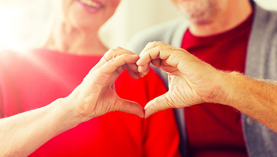 Senior couple getting theri hearts healthy with guidance from Cary chiropractor